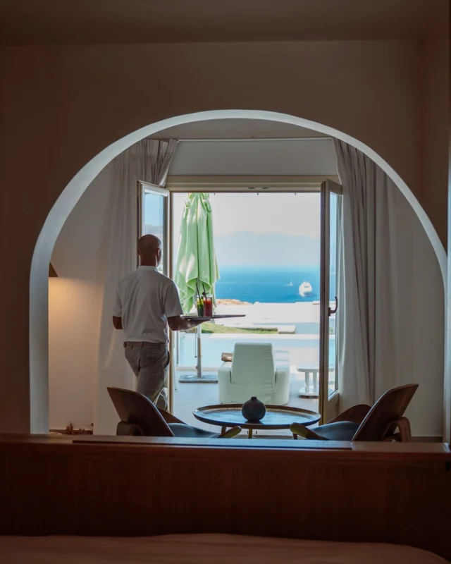 Service is not performance but presence: a gesture, a glance, a moment that anticipates what you need before you ask. Every movement, from the opening of a curtain to the setting of a tray, is part of a rhythm that belongs entirely to this place, calm, precise, and deeply personal. Because true hospitality isn’t about being seen; it’s about making you feel seen.#MyconianCollection #Mykonos #MykonosGreece #Cyclades #Aegean #Travel #EditorialStyle #ArtOfLiving #IslandStories